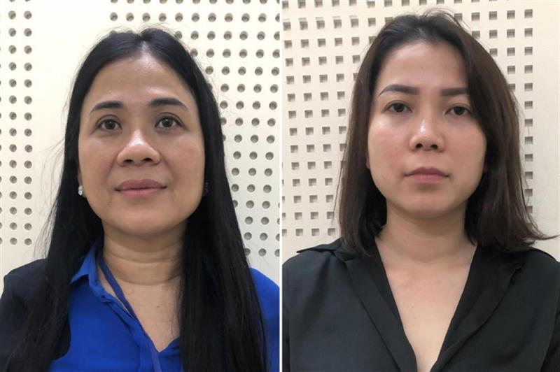 Bị can Mai Thị Hồng Hạnh (trái) và bị can Nguyễn Thị Như Phương (phải).