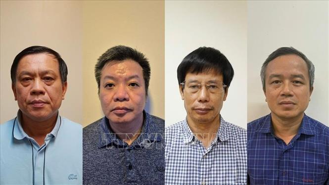 Các bị can từ trái qua phải: Nguyễn Bá Hoan, Tống Hải Nam, Nguyễn Gia Liêm, Phạm Viết Hương. Ảnh: TTXVN