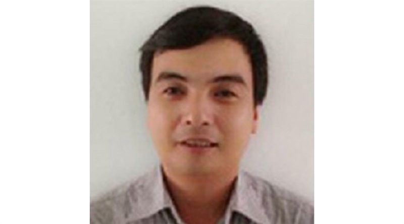 Cơ quan Cảnh sát điều tra đọc lệnh khởi tố, bắt tạm giam ông Nguyễn Quang Trung hồi tháng 12-2021.