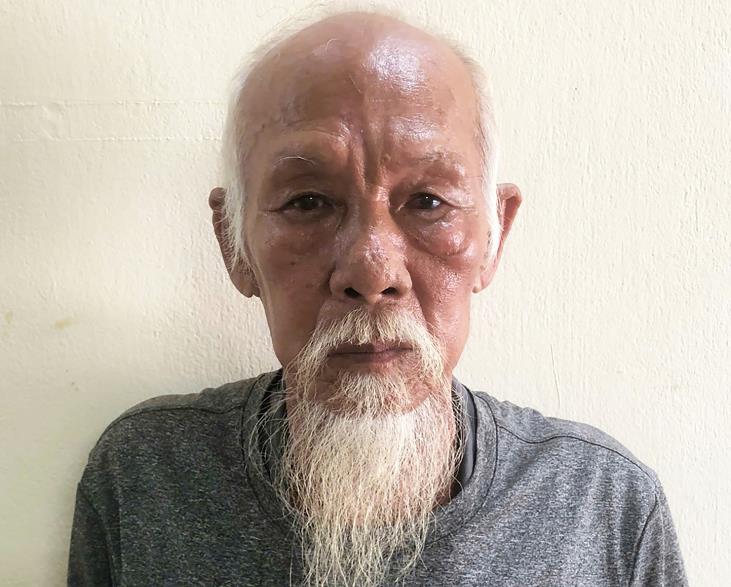 Nguyễn Hồng Tuấn tại cơ quan công an. Ảnh: N.T