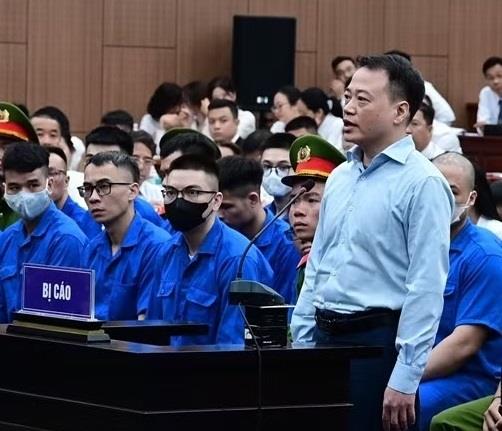 Bị cáo Nguyễn Hòa Bình tại phiên tòa.
