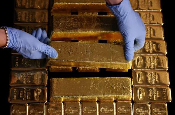 Vàng bị bán tháo trước tiến triển đàm phán thương mại Mỹ-Trung